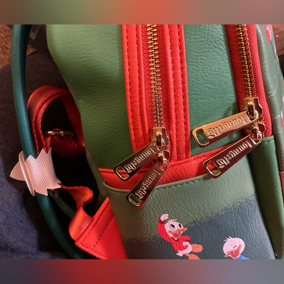 Disney: Loungefly Classic Christmas glow in the dark mini backpack green &orange - Picture 7 of 9